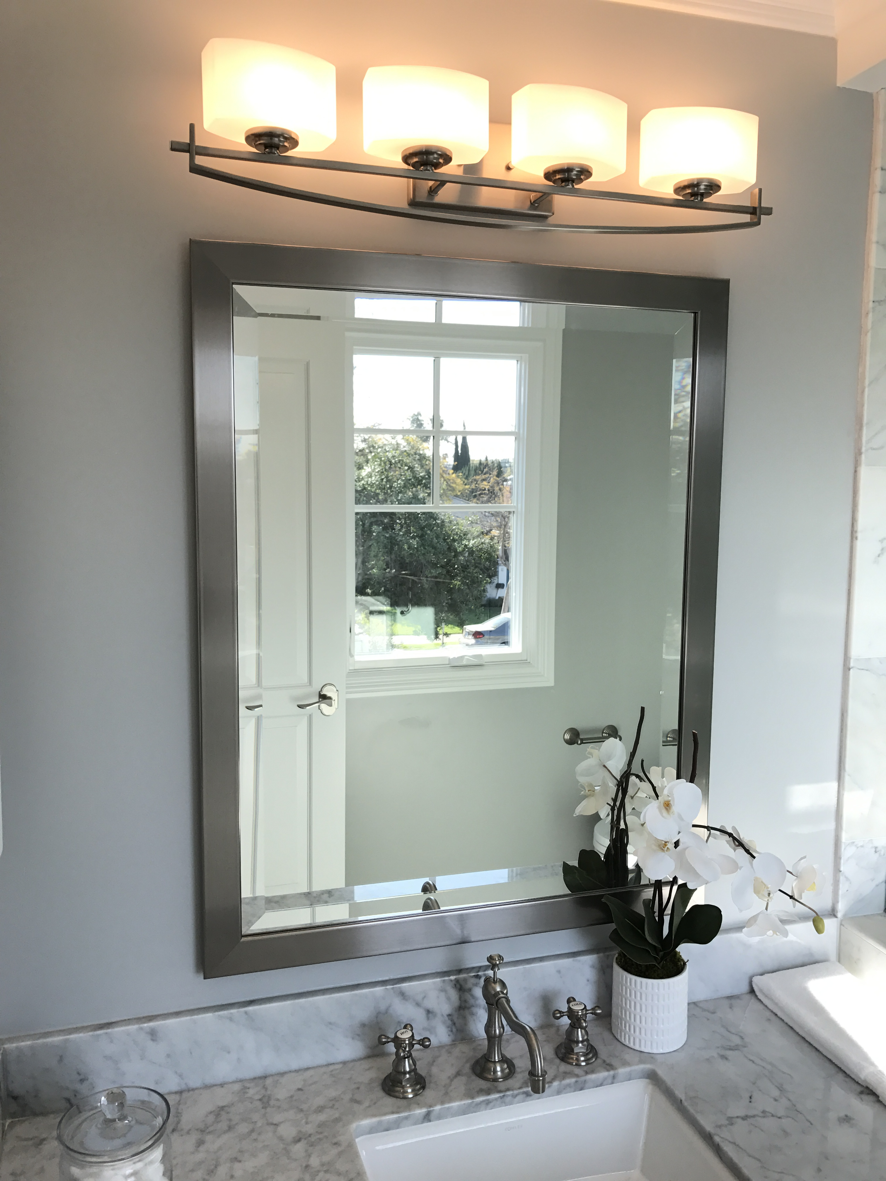 Custom framed mirror installed by DC Glass
