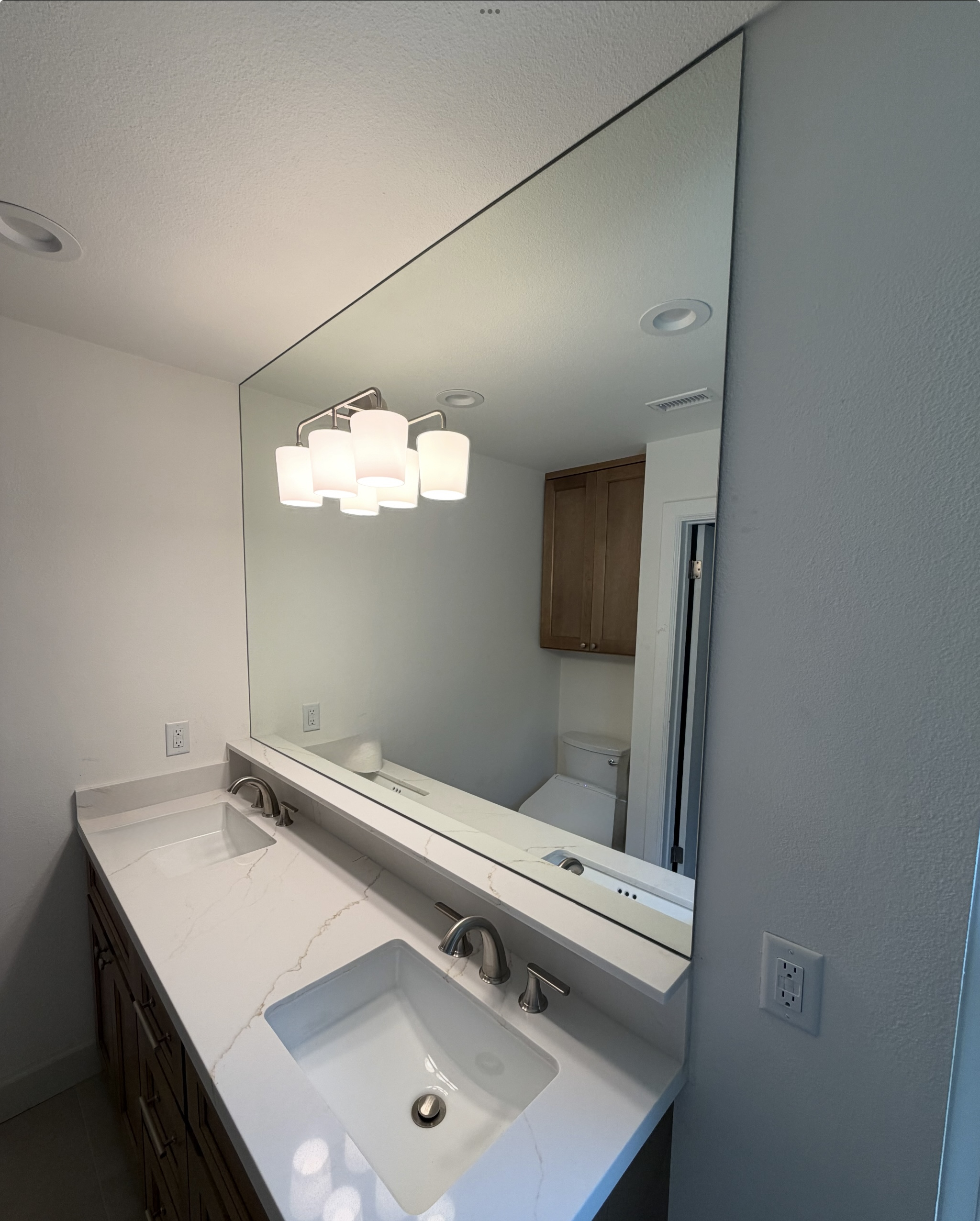 Custom mirror installation by DC Glass