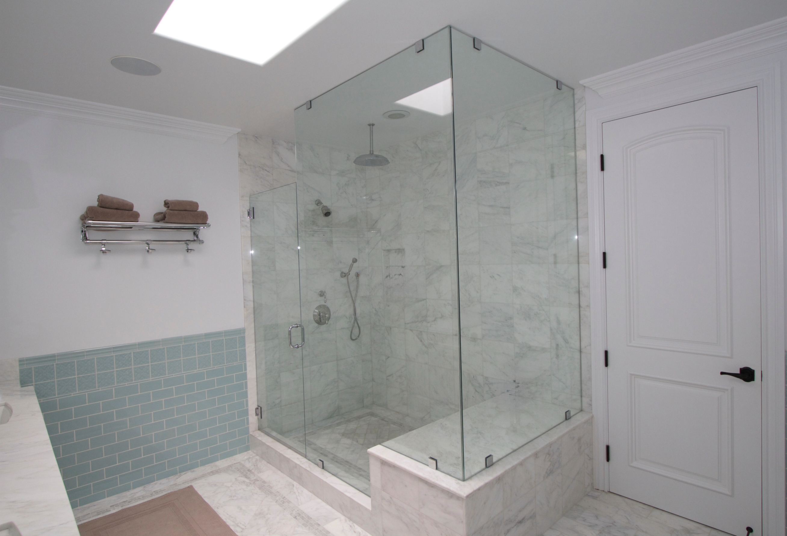 Custom frameless shower enclosure