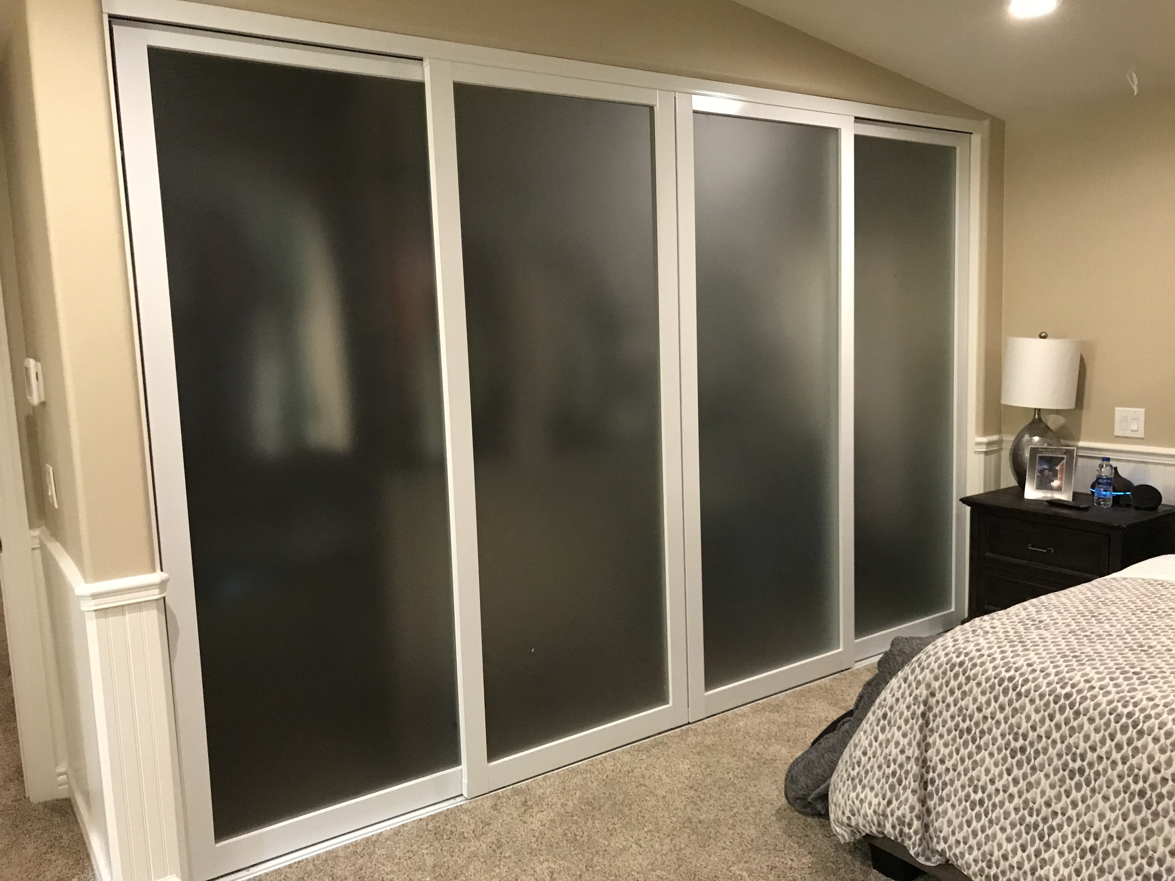Custom sliding glass closet doors installed by DC Glass