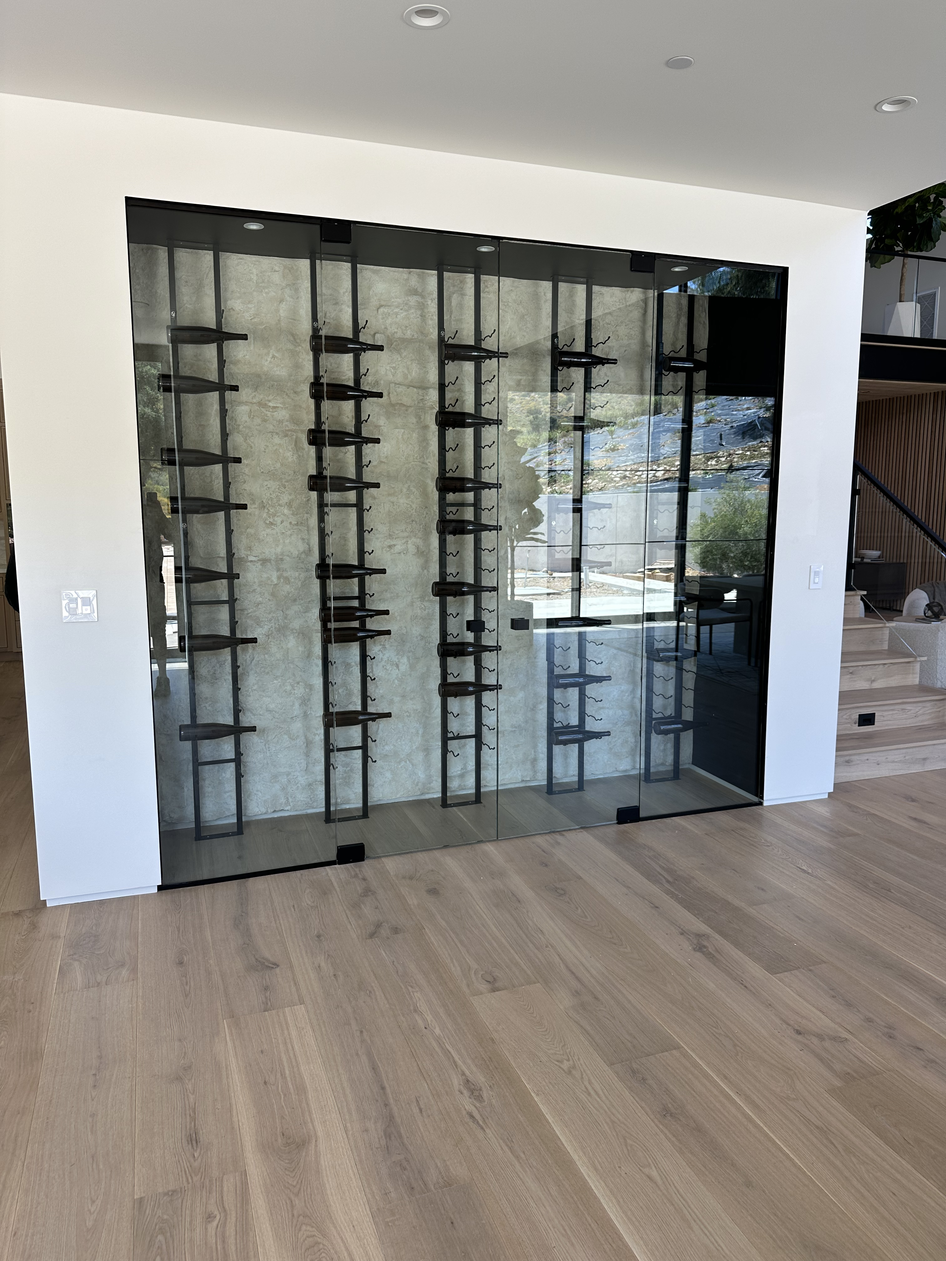 Custom wine cellar glass installation by DC Glass